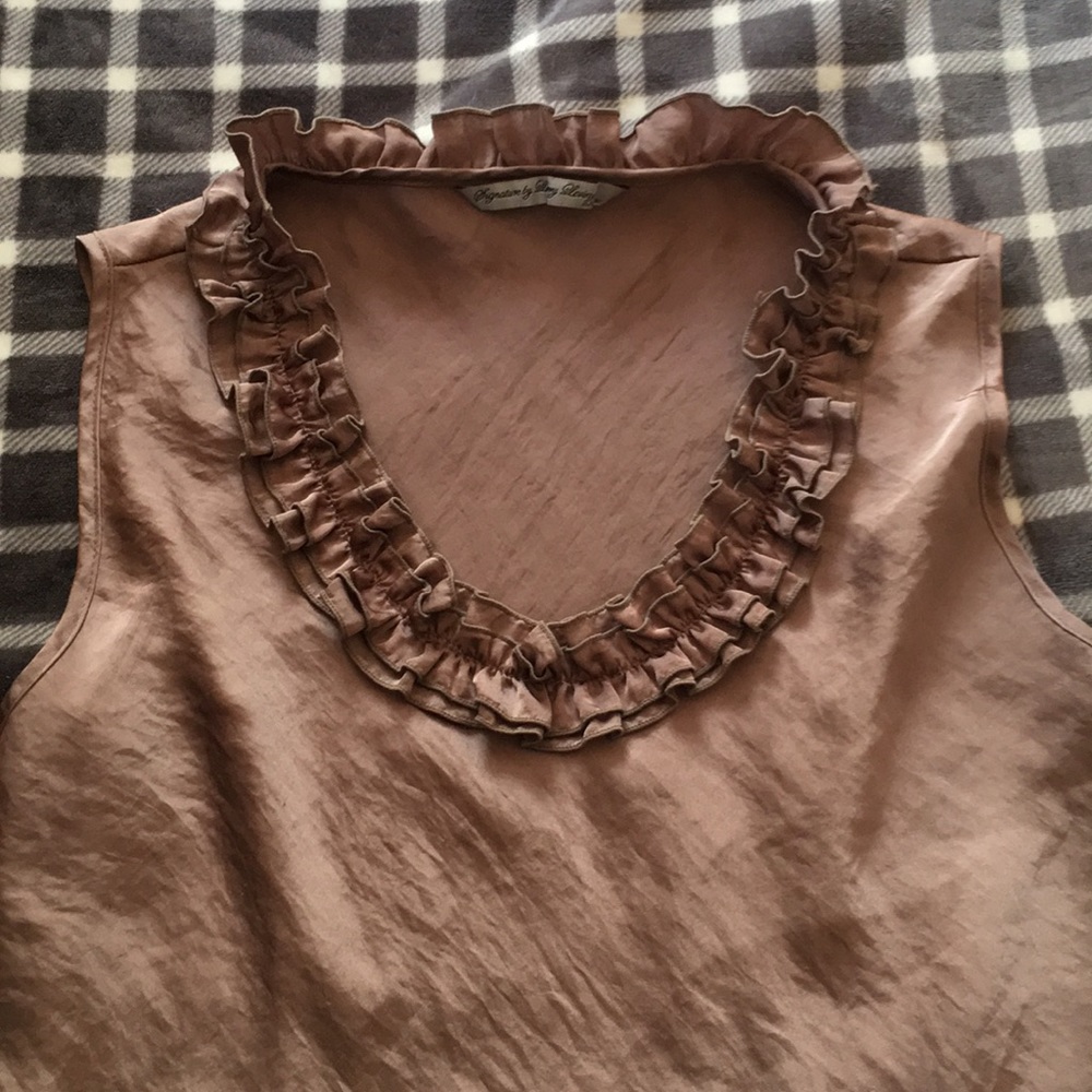 Tan sleeveless blouse with ruffled neckline
